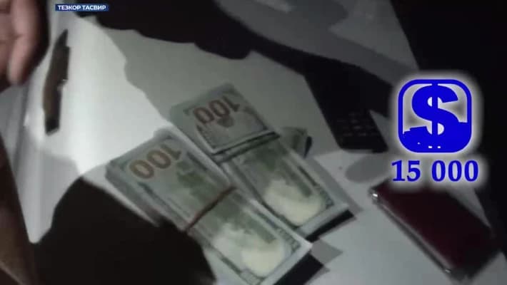 В Навои задержали инспектора профилактика при получении 15 тыс. долларов